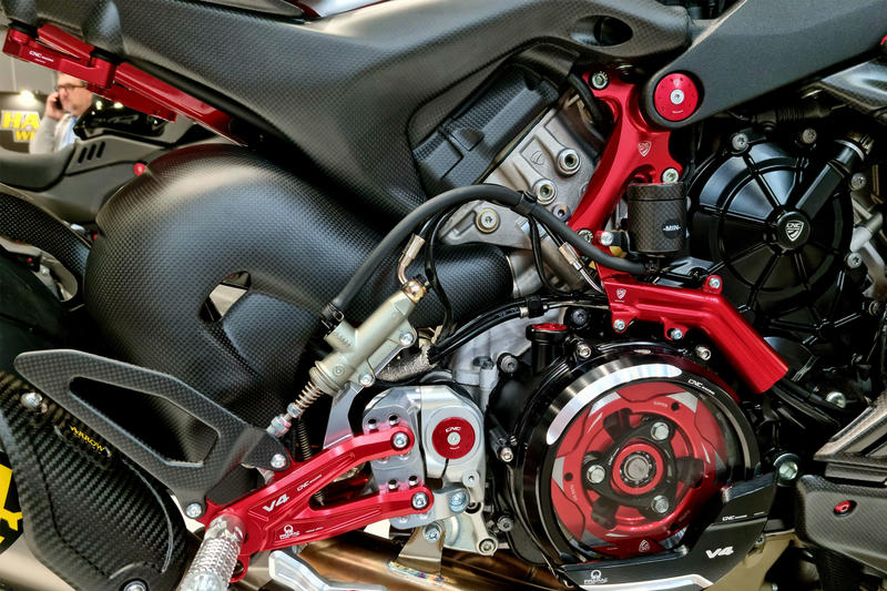 Brake lines cover with fluid tank bracket Ducati